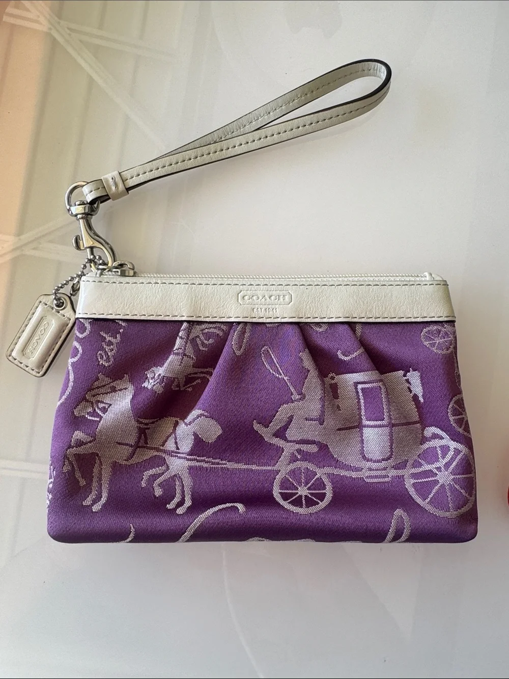 Coach Purple Wristlet with White Trim and Carriage Motif